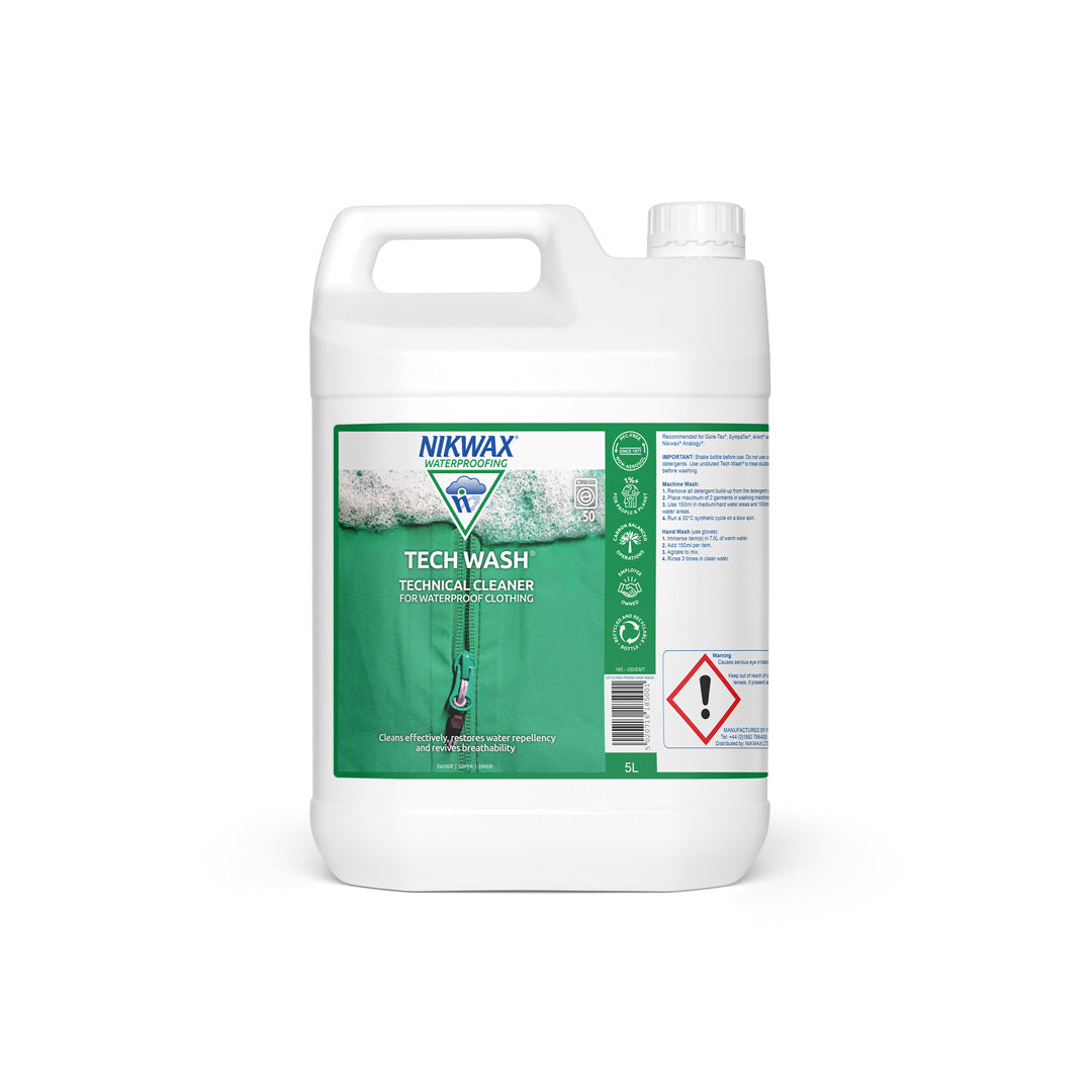 5 litre bottle of NikWax Tech Wash. Bottle is white with a white lid. Label features a close up image of a zippered green jacket with foam at the top of the label | NW185