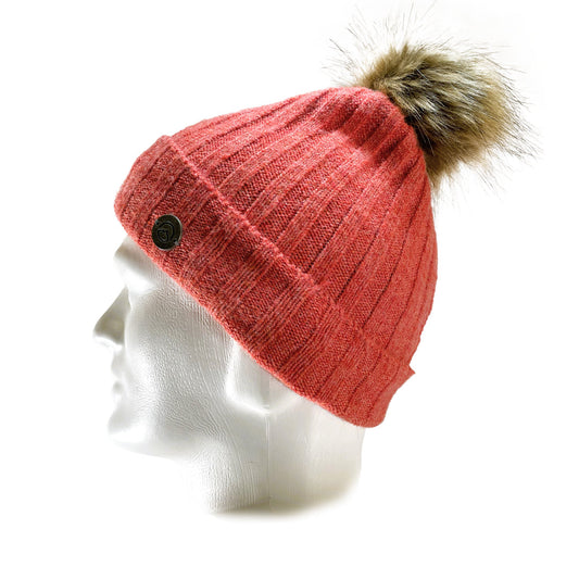 Side view of Domex Pink thick rib-knit cuffed beanie with fluffy faux-fur accent pom pom | Ships from Melbourne