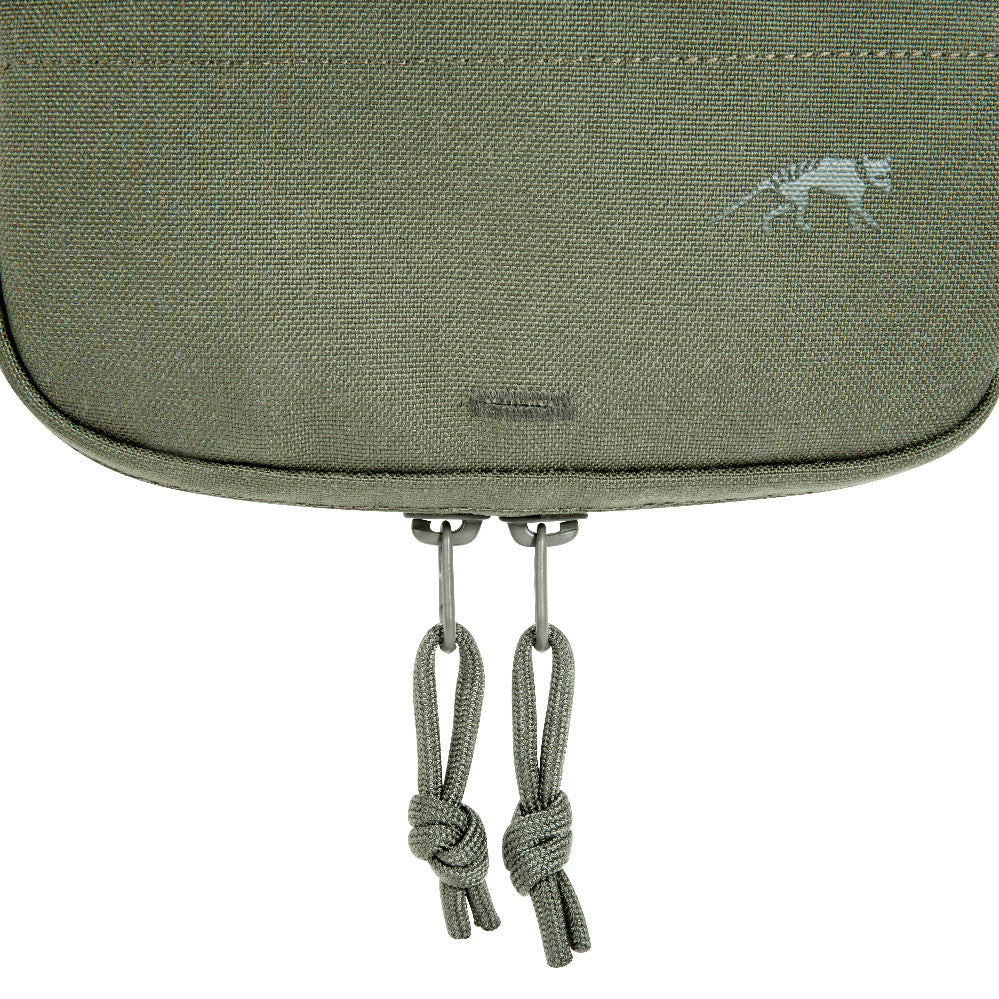 Close up of zipper pulls on bottom of the Bladder Pouch