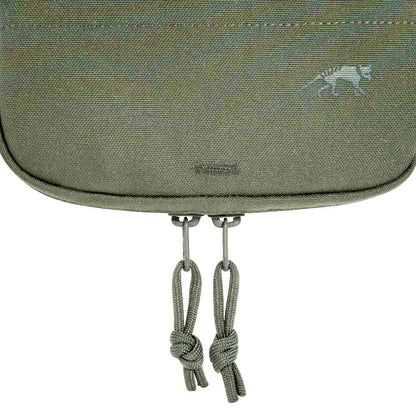 Close up of zipper pulls on bottom of the Bladder Pouch
